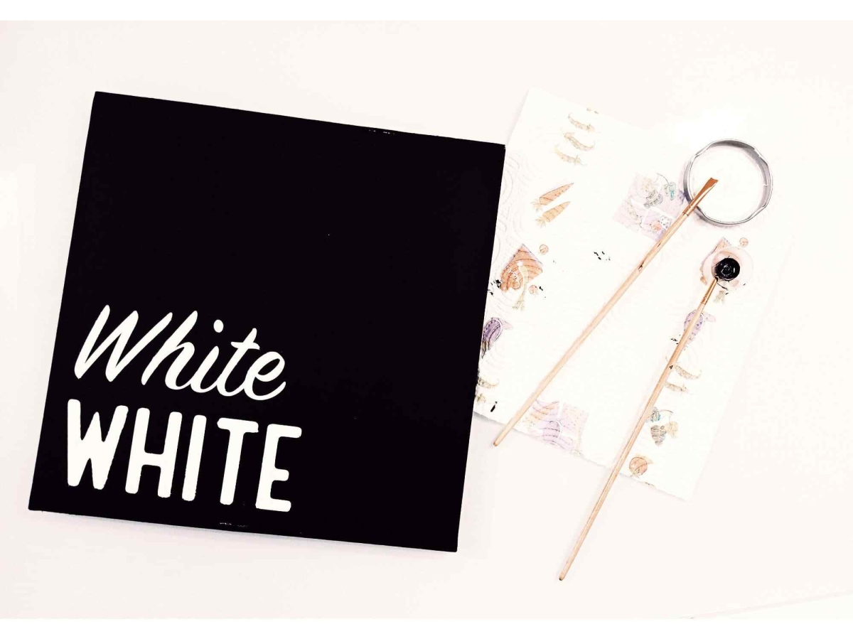 white-signpainting-Nesia-earth